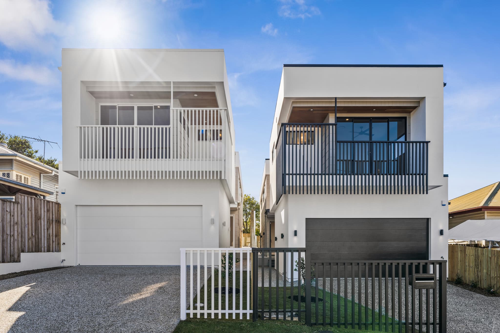 Two custom narrow block house designs in Brisbane featuring 10m frontages, modern white rendering, and multi-storey facades.